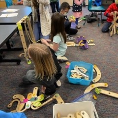 Children creating and building with library materials.