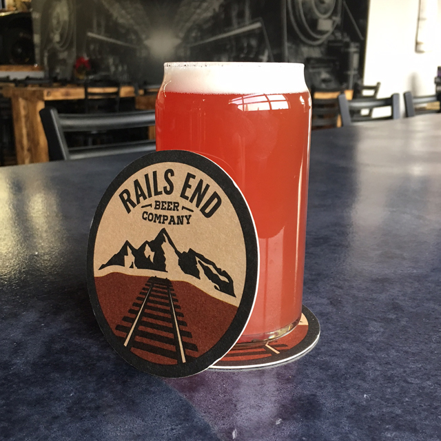picture of pint of beer with coaster with rails end logo