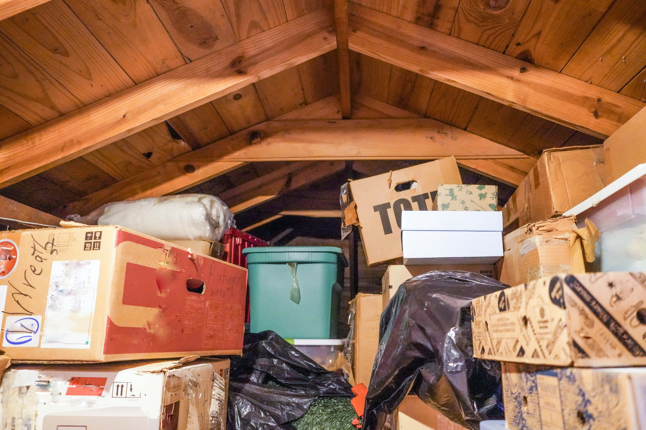 photo of attic filled with boxes