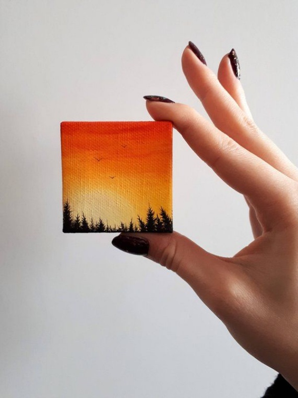 painting of sunset on a tiny canvas