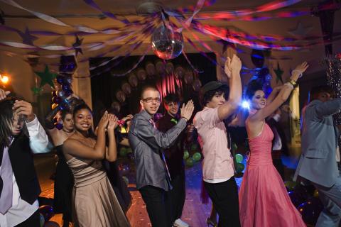 teens dancing at prom