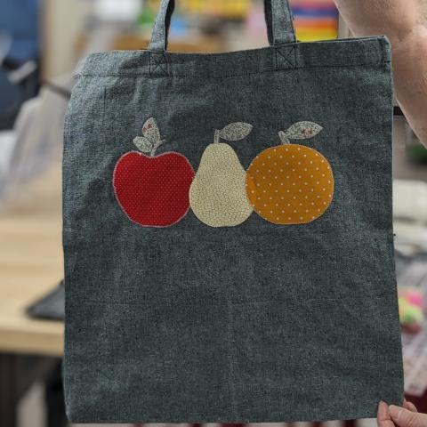 fabric tote bag with three fruits appliqued/sewn onto bag