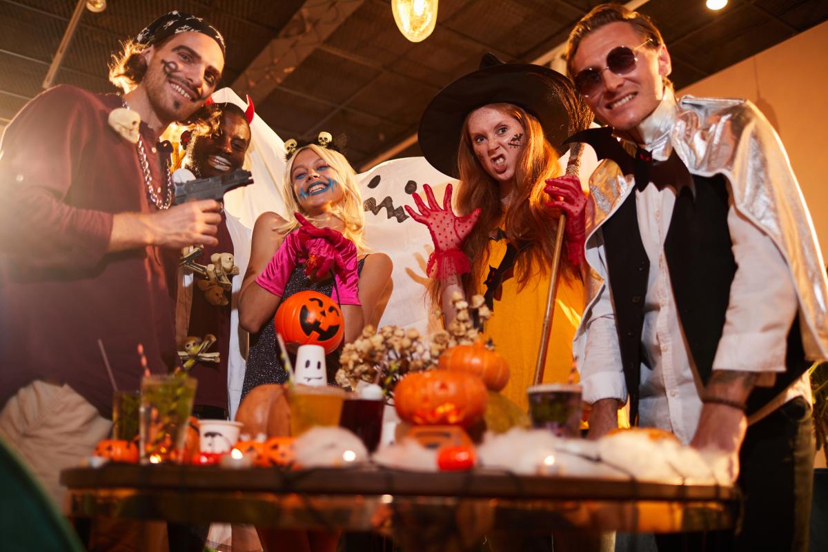 Teens in costume at Halloween Party