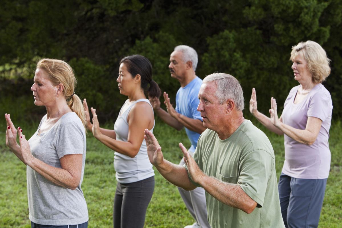 Adults doing Tai Chi