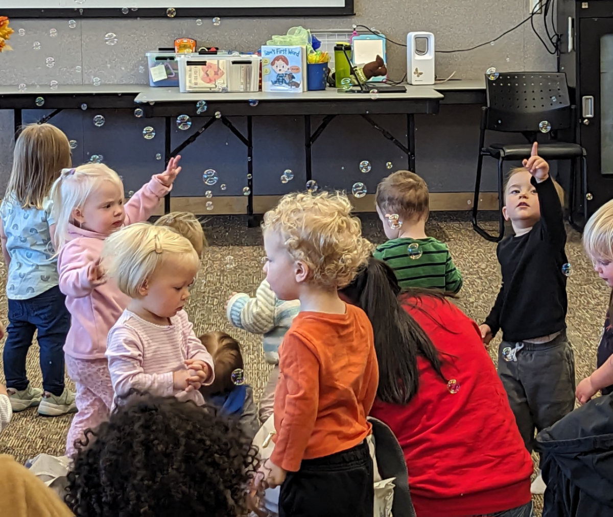 Kids playing with bubbles