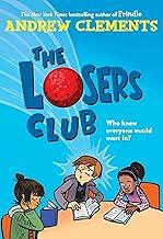 3 Kids sitting at a table reading a book.